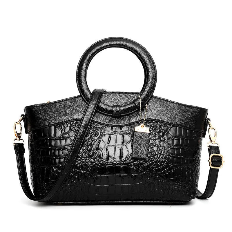 Ladies fabric handbag with multiple zipper compartments in six colour options showing organisational pockets