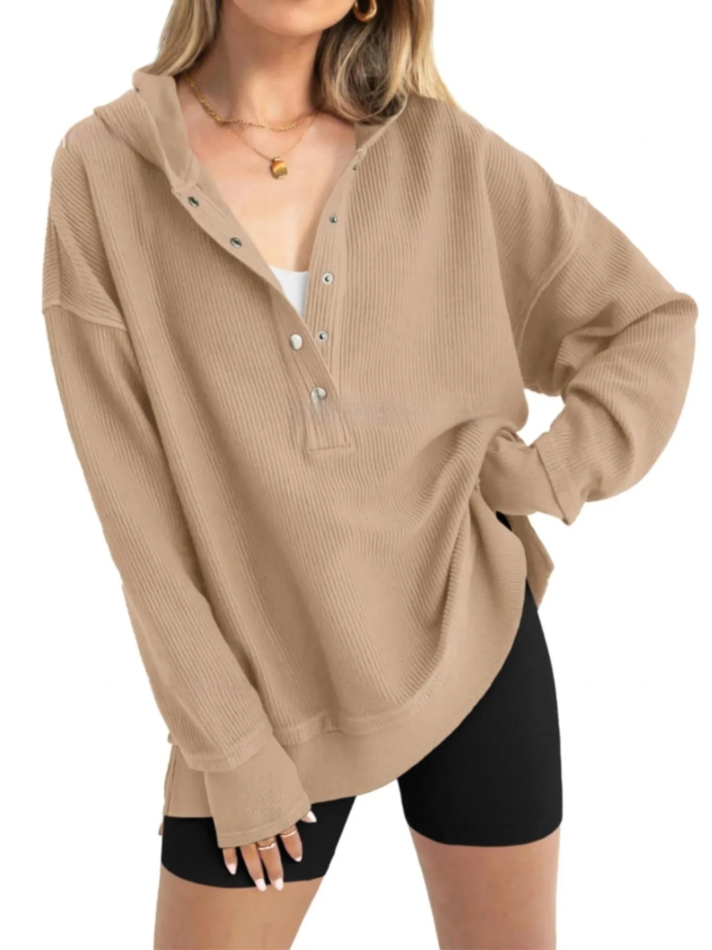 Women's loose raglan sleeve pullover sweater in peacock green colour, laid flat.