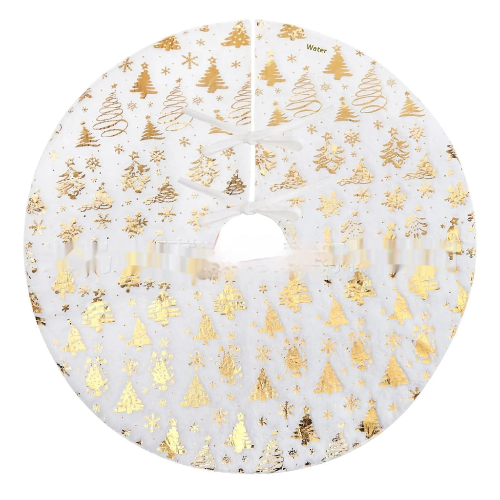 Plush red Christmas tree group mat with white snowflake XINGX pattern on a wooden floor.