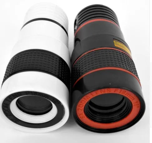 12X magnification phone telescope lens with adjustable mounting clip and cleaning cloth on a table.