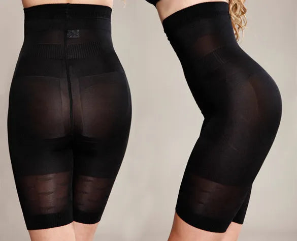 Women's black seamless high waist shapewear shorts laid flat, showing the tummy control panel.