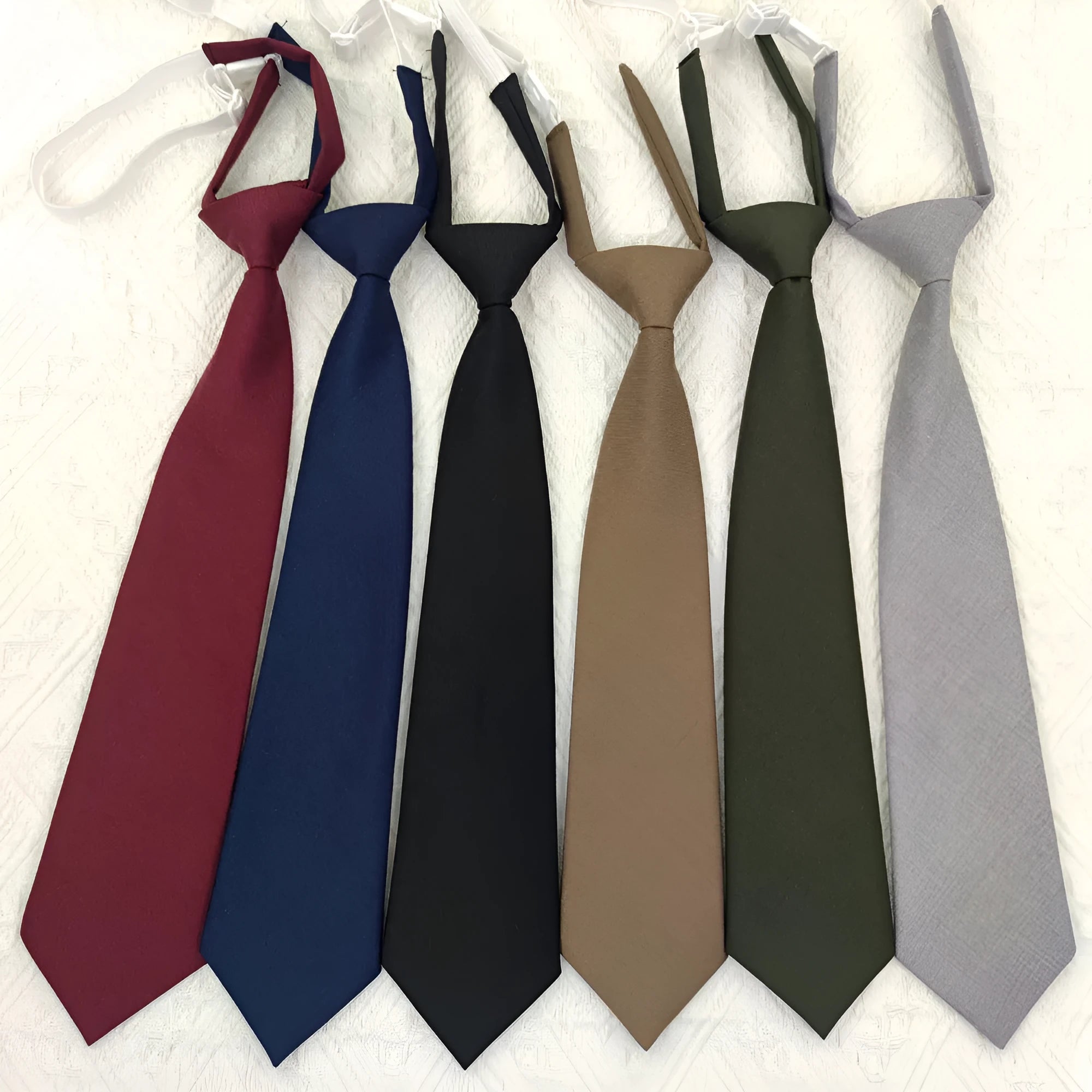 Solid navy blue men's cotton bow tie with arrow type styling measuring 35cm by 7cm