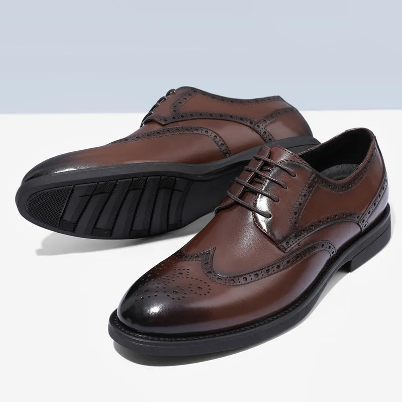 Men's black and brown brogue leather shoes in business style with traditional detailing