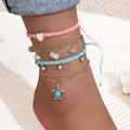 Hand-woven blue love foot rope natural gravel anklet in alloy with geometric shape on a woman's ankle