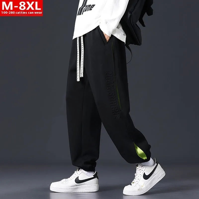 Men's loose fit trousers with stitching printing detail and banded ankle cuffs in micro elastic cotton fabric