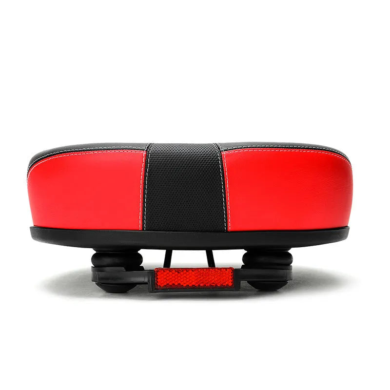 Large red thickened bicycle saddle with shock absorber and reflective sticker, dimensions 210x270mm.