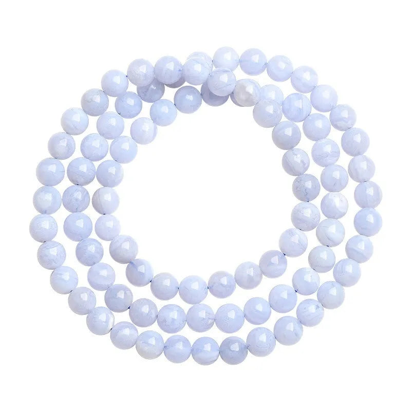 Blue agate bracelet with natural striped patterns on 6-6.8 mm beads in unisex design