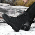 Beige cowhide leather hi-top hiking sneakers on a neutral background