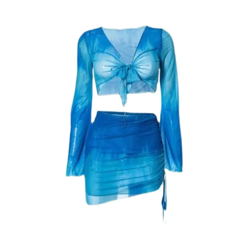 Blue four-piece women's bikini swimsuit set showing shirt, bra, high-waisted briefs, and skirt laid flat.