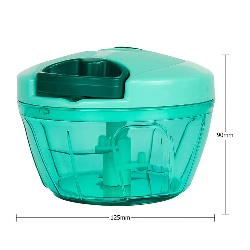 Green manual kitchen chopper with stainless steel blades and a clear lid, showing its compact size.