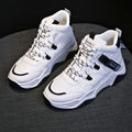 Women's high top white sneakers with PU upper, rubber sole, lace-up fastening on a plain background