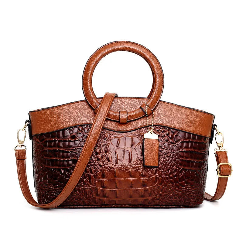 Ladies fabric handbag with multiple zipper compartments in six colour options showing organisational pockets