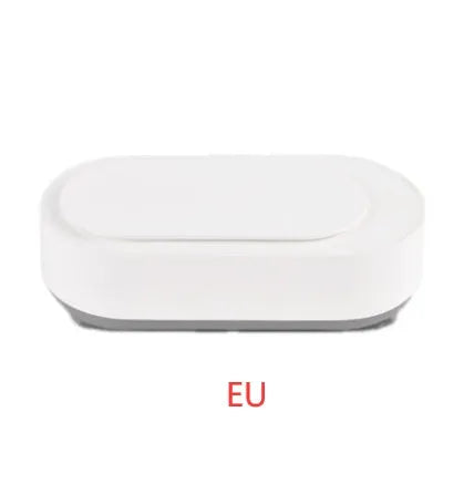 White portable ultrasonic cleaner machine with stainless steel tank for cleaning jewellery and glasses.