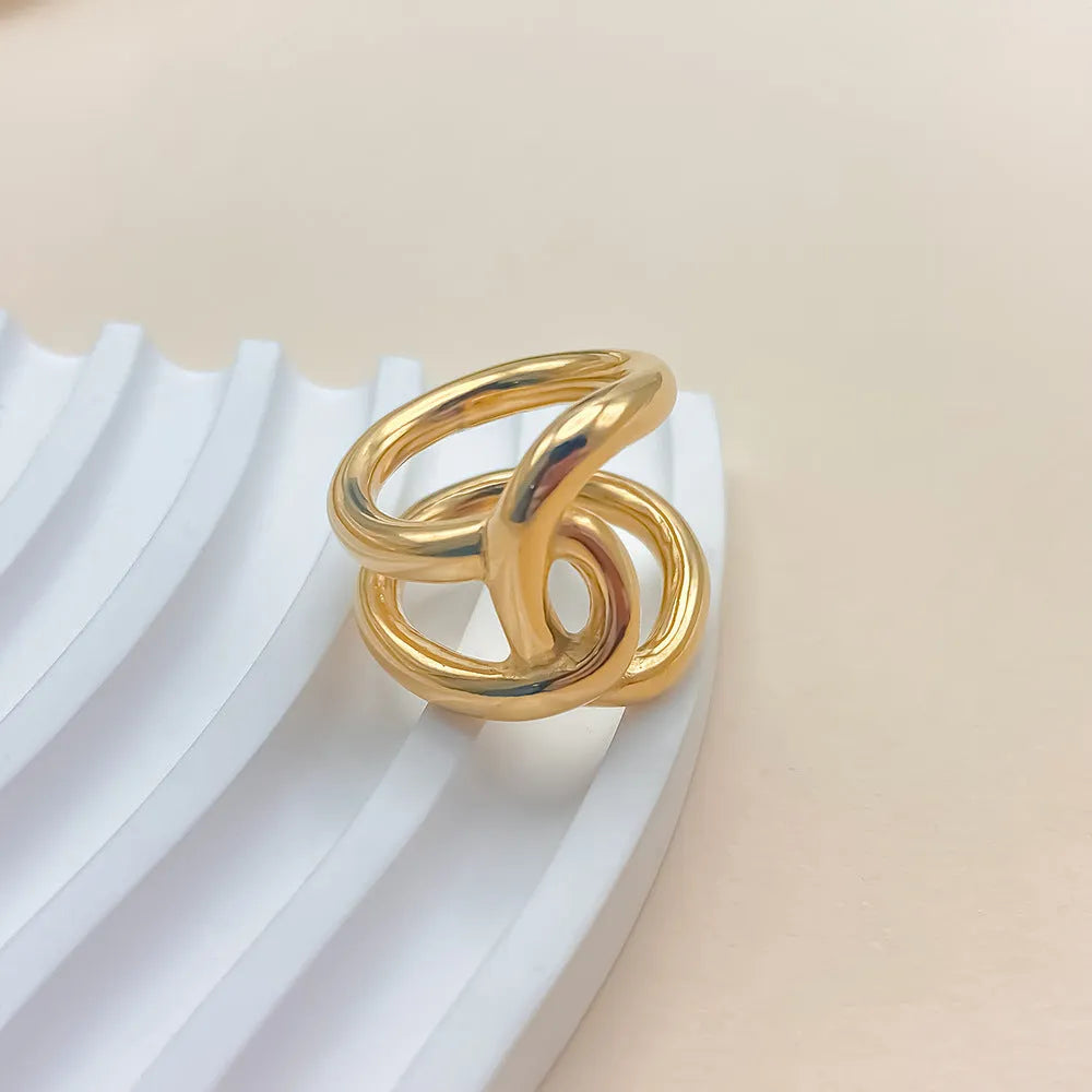 Women's adjustable geometric ring with knotted U-shape design in stainless steel