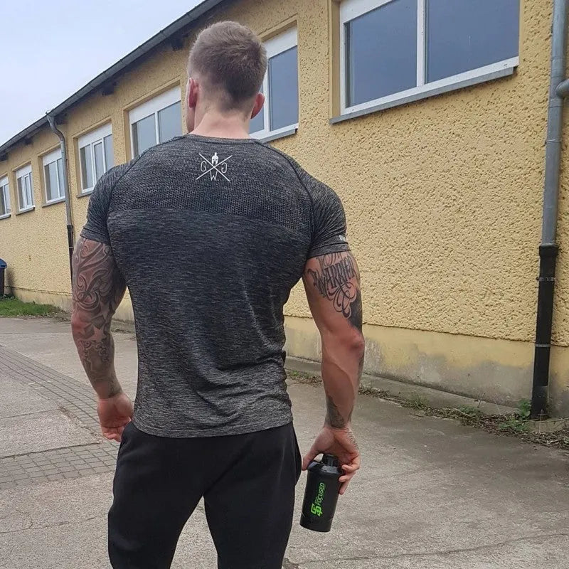 Men's short sleeve polyester workout top in blue, size M to 3XL, for gym training