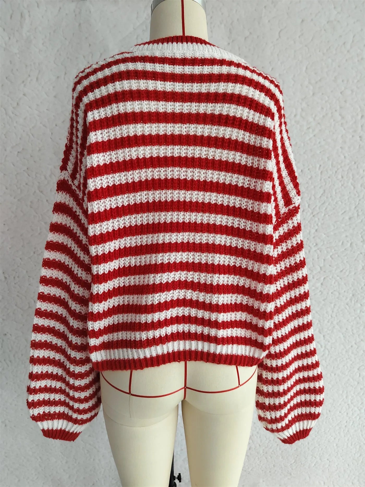 Women's vintage stripe knitted loose-fit pullover sweater in polyester, shown in a selection of colours.
