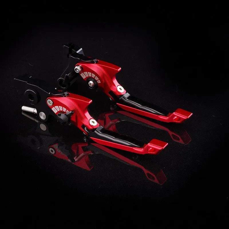 Pair of anodised metal motorcycle horn handle clutch levers with six-speed adjustable length, shown in a selection of colour finishes