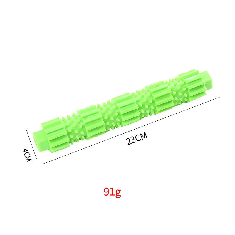 Green rubber dog chew toy with treat dispensing holes for aggressive chewers