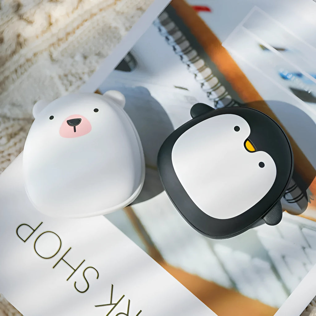 Cartoon penguin and polar bear USB rechargeable hand warmers showing front design