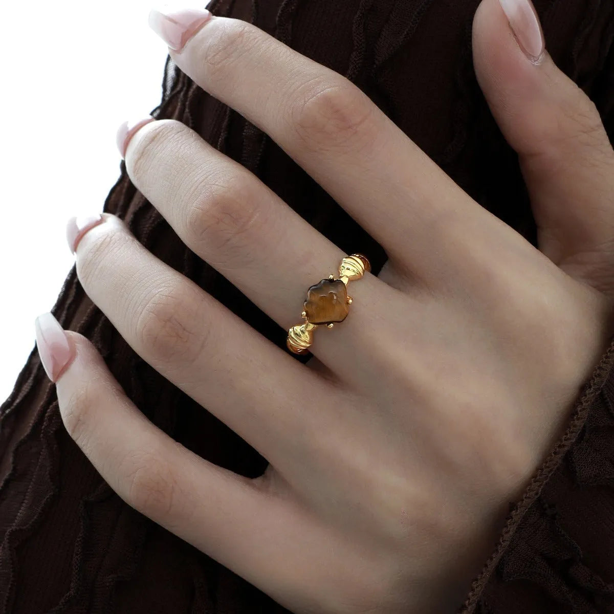 Women's adjustable silver ring with a shell tiger eye stone in white gold or gold colour.