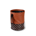 Retractable leather car interior trash can showing folded and extended positions