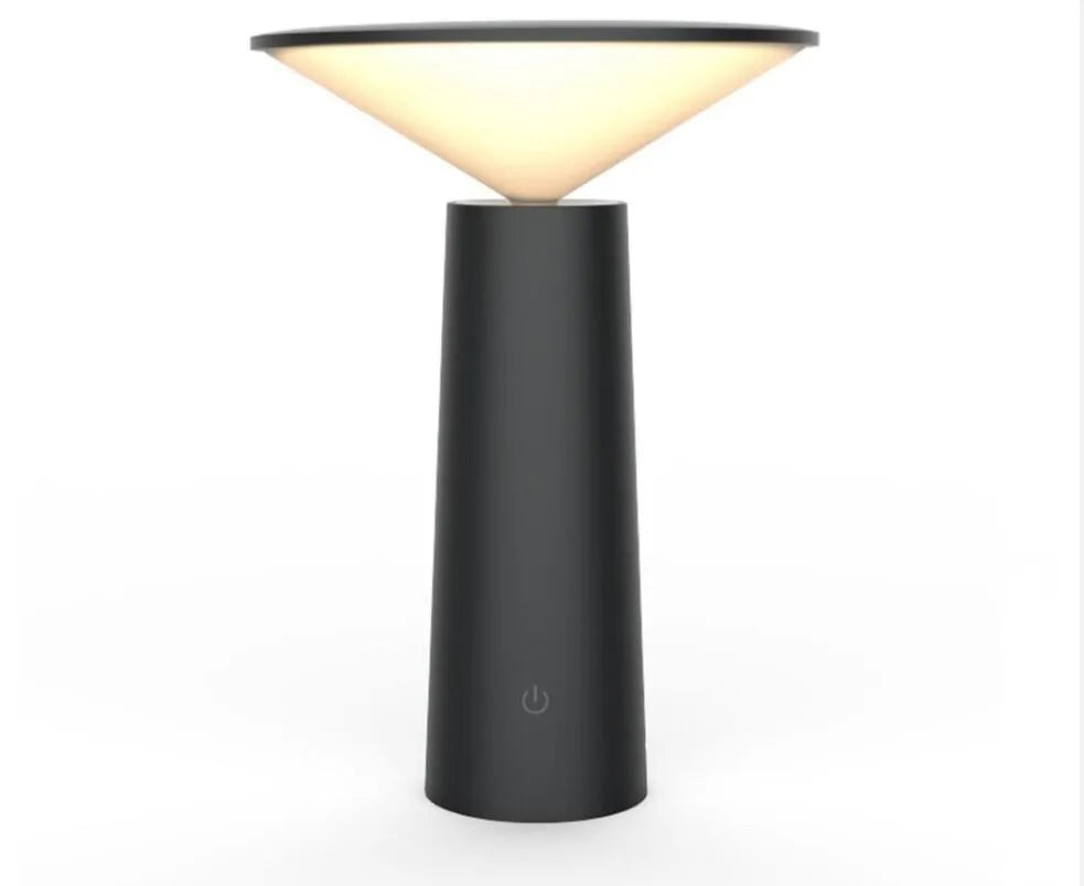 Black USB rechargeable desk lamp with touch sensor and adjustable lamp head on a wooden table.