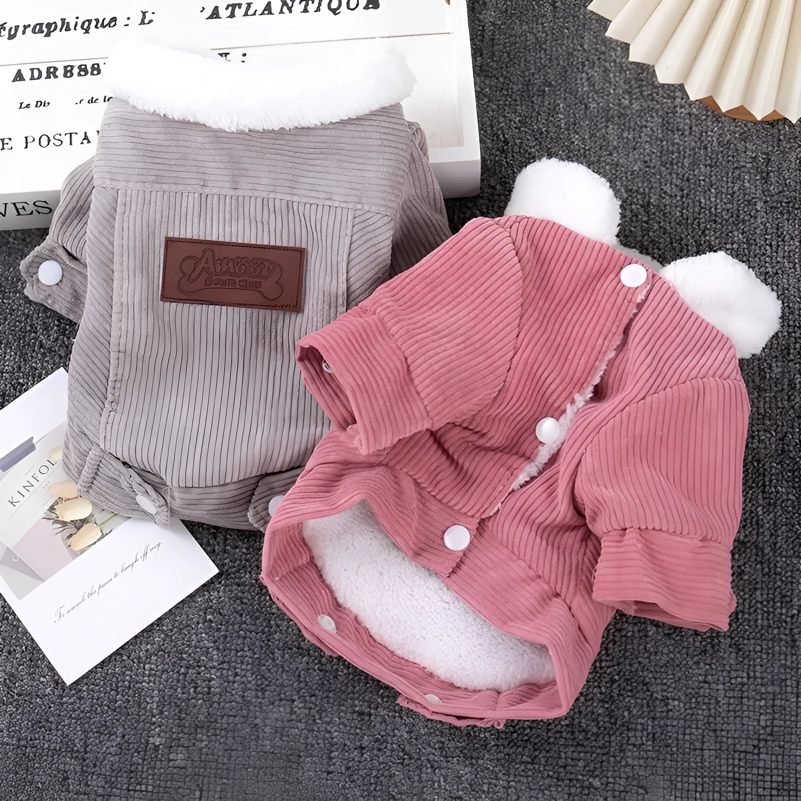 Grey lambswool fleece-lined vest for dogs or cats on a mannequin, showing wool lining and vest style.