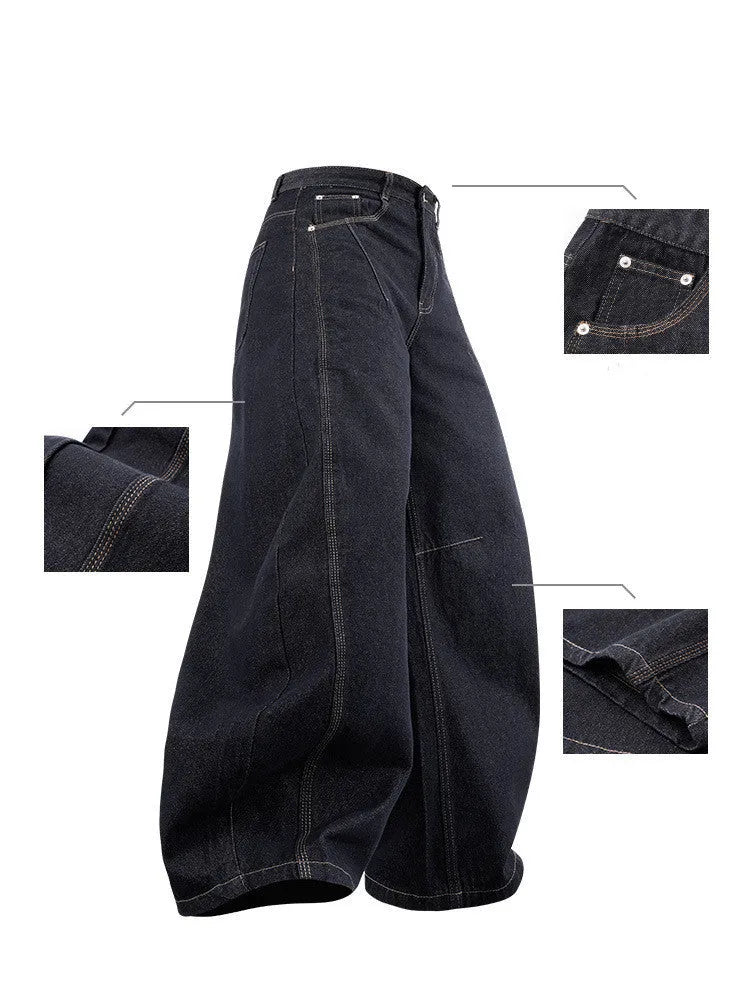 Men's original cow coloured wide leg denim trousers with a mid waist, laid flat.