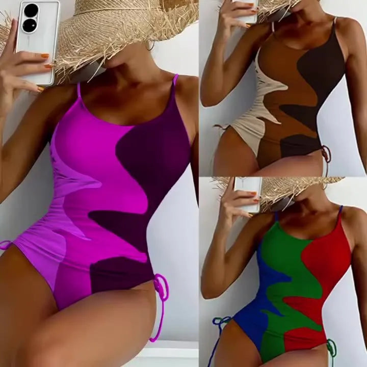 Women's sleeveless backless one-piece swimsuit in blue, shown in a solid colour style.