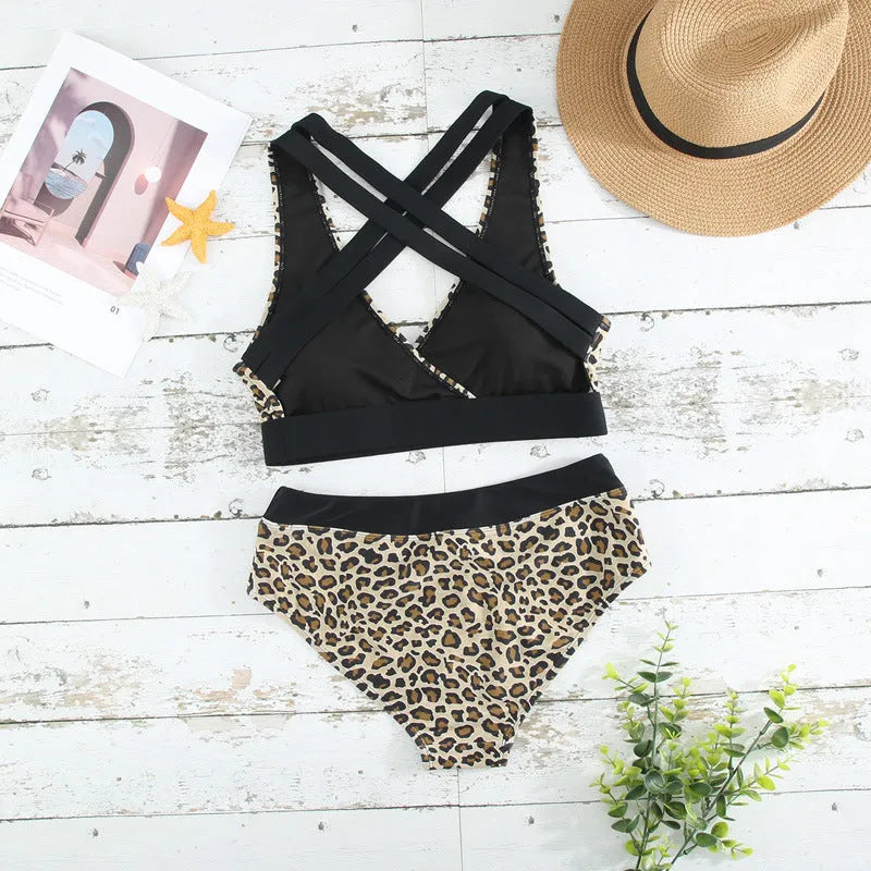 Leopard print women's bikini swimsuit with cross banded back and V-neckline.