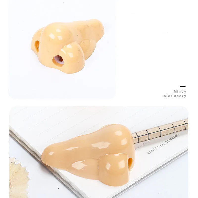 Flesh colour geometry-shaped plastic pencil sharpener with big nostril.