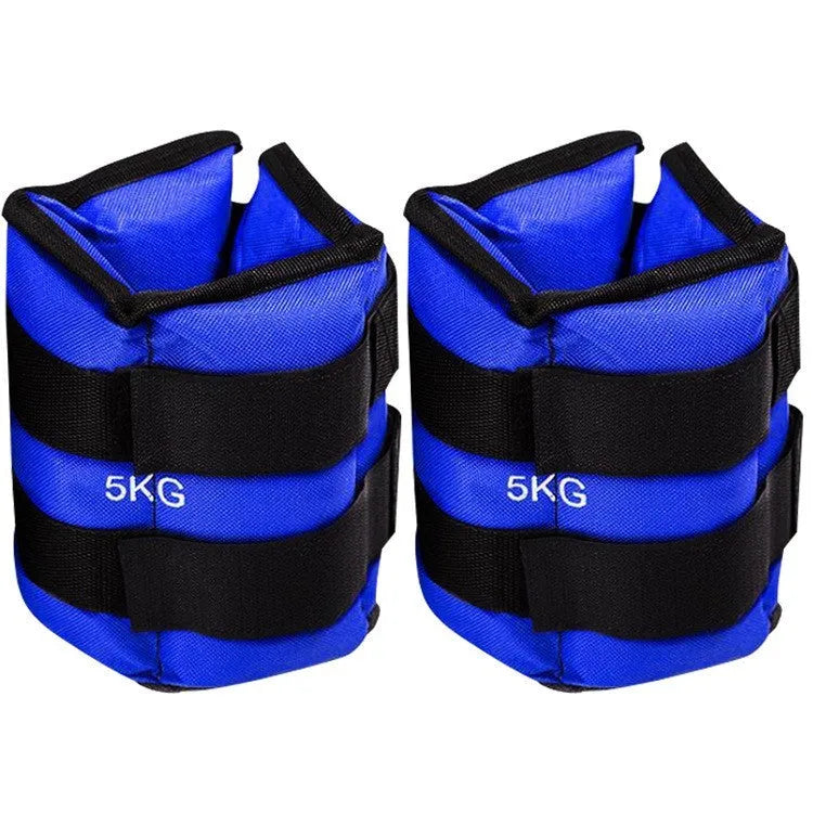 Pair of Oxford cloth legging sandbag weights for athletic training, shown with ankle strap.
