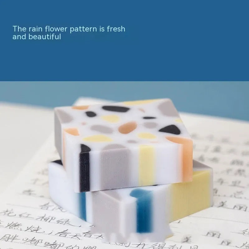 White brick-shaped rubber eraser for pencil marks with Super Clean Traceless branding