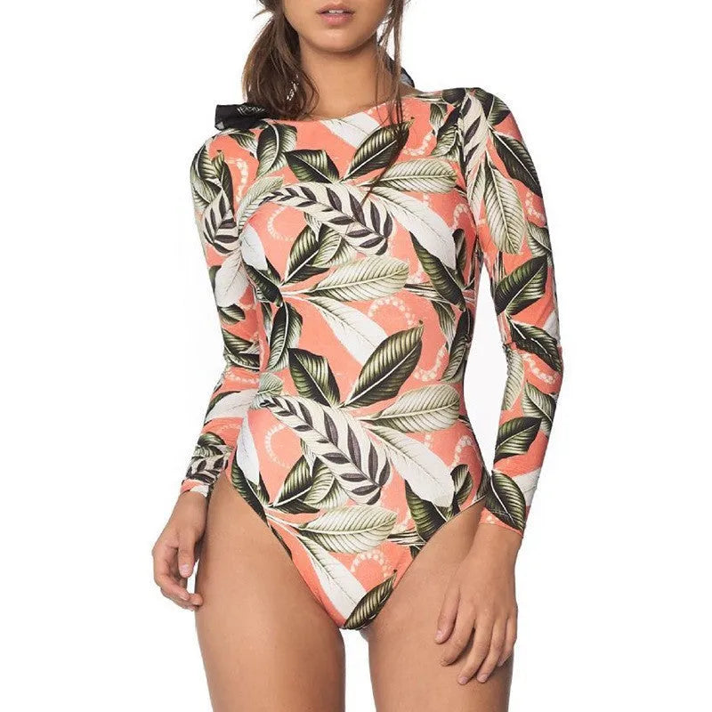 Women's leaf print backless one-piece swimsuit on a white background.