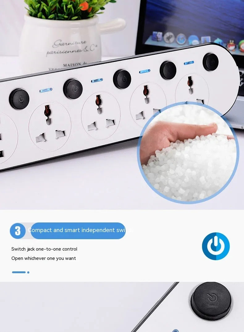 Multi-switch power strip with international sockets, USB ports, and a long cable on a desk.