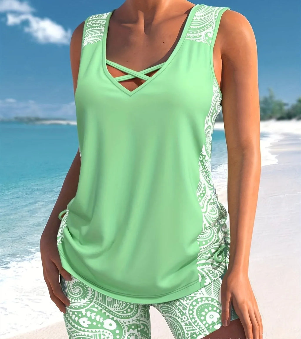 Women's swimsuit set showing matching top and printed split boxer shorts in polyester fabric