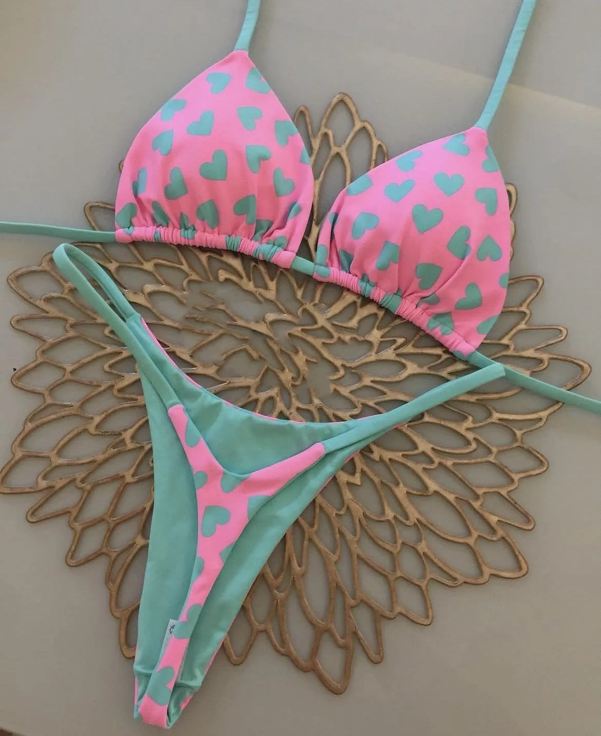 Heart printing backless split swimsuit in nylon fabric with cotton lining, available in sizes S, M, L