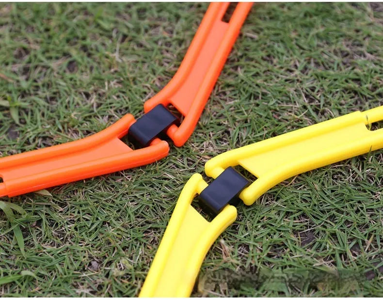 Six foldable hexagon agility training rings in yellow, green and orange colours for football drills