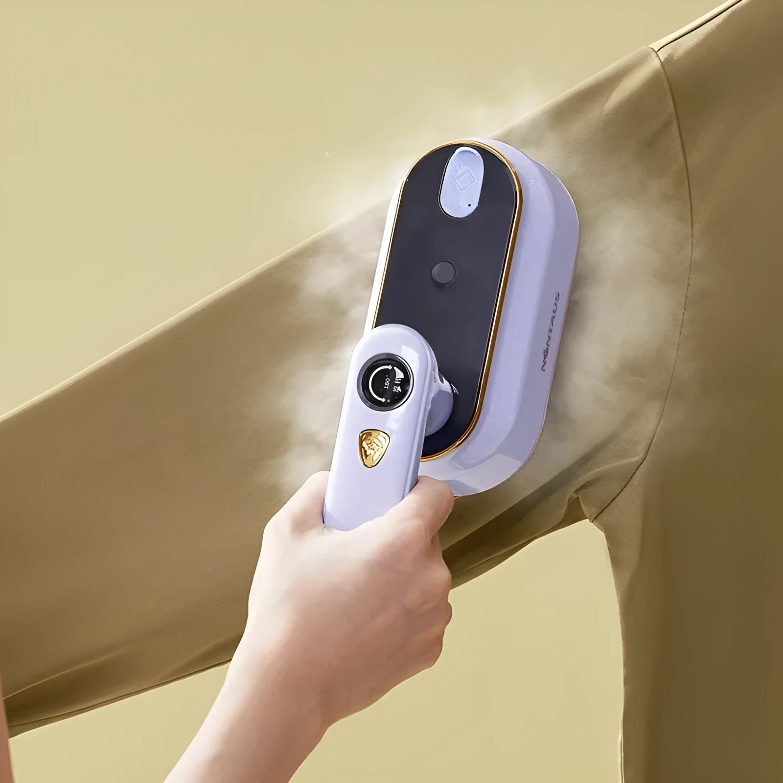 Foldable portable steam iron in light purple on a white background, showing its compact design and ceramic soleplate.