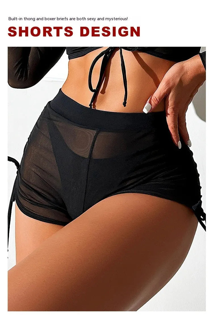Black long sleeve mesh bikini top and briefs from a four-piece women's swimwear set.