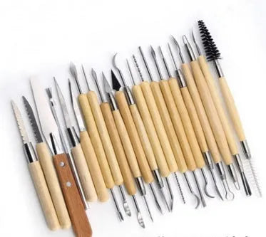 27-piece pottery clay tool set with stainless steel, wood, and plastic tools in a roll-up package