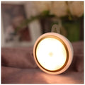 Circular motion sensor LED light unit showing front diffuser and compact 80mm diameter design
