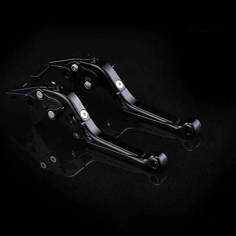 Pair of anodised metal motorcycle horn handle clutch levers with six-speed adjustable length, shown in a selection of colour finishes