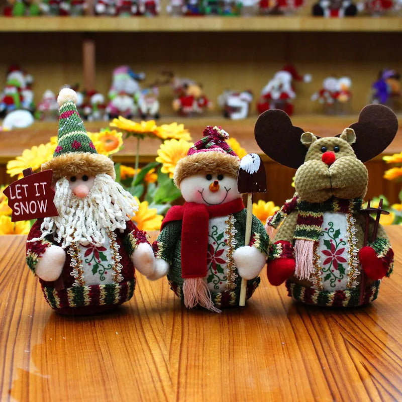 Flannel Christmas decorations set showing Snowman, Old Man, and Elk figures each measuring 18cm by 13cm in red, green, and white