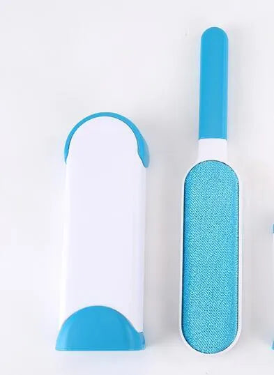 Blue reusable pet hair removal comb with double-sided flannel brush and self-cleaning base for sofas.