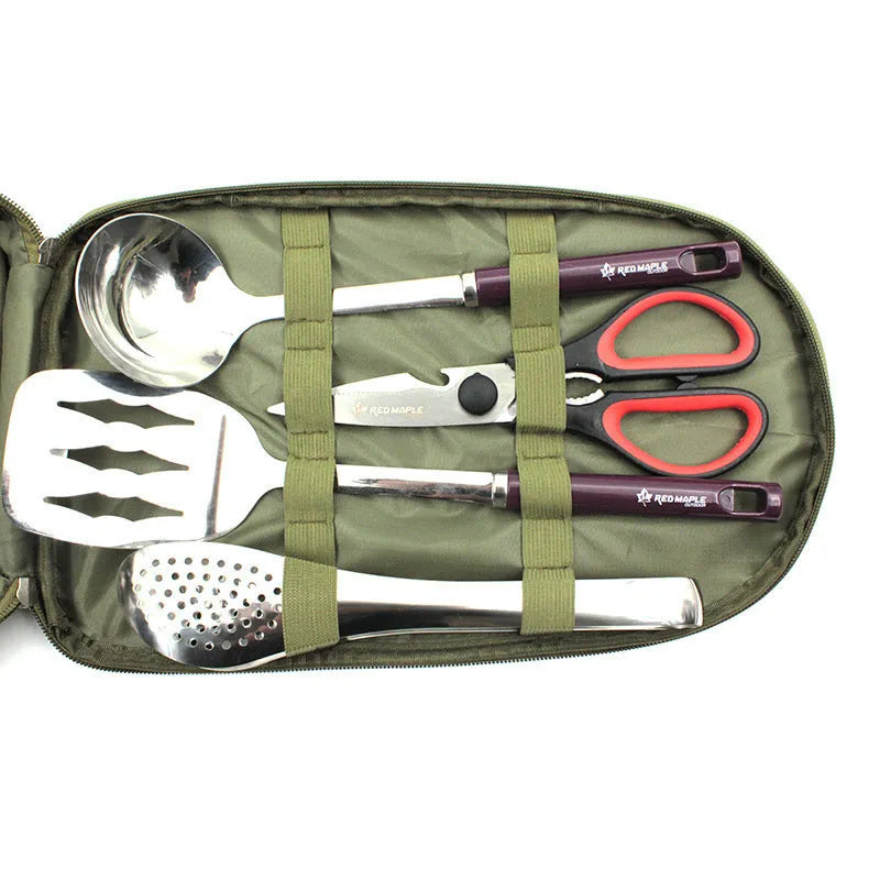 Camp kitchen cooking utensil set 8 pieces stainless steel with oxford storage bag on green background
