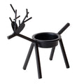 Black iron Christmas candlestick holder with detailed elk and deer design