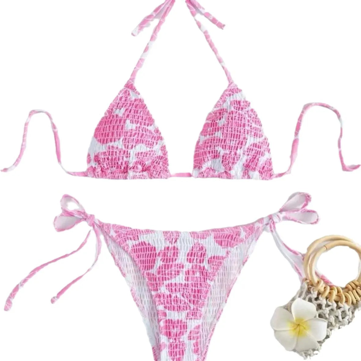Women's pink floral halter neck swimsuit top and briefs set on a neutral background