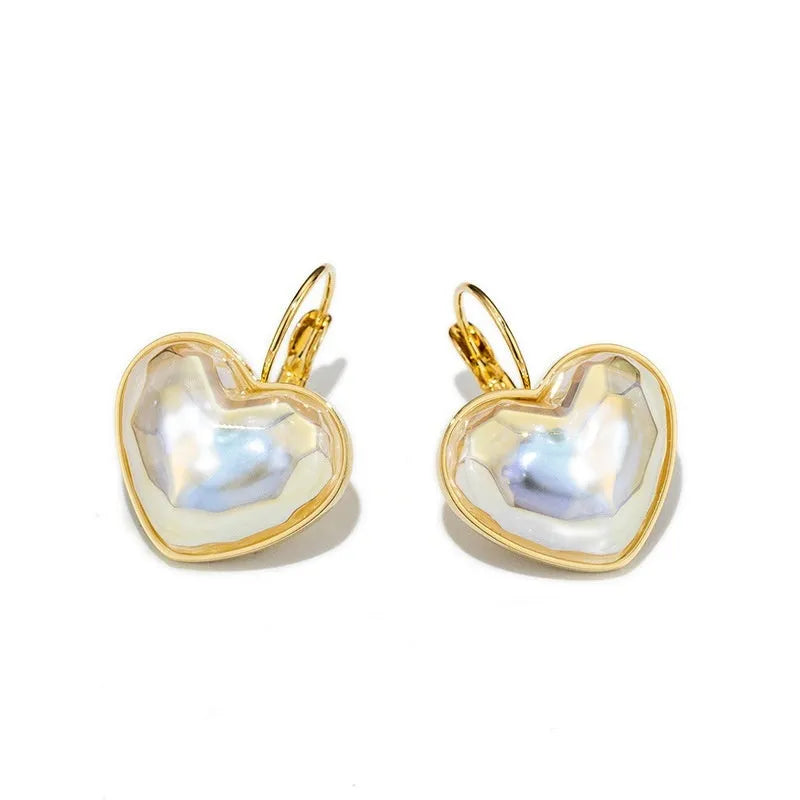 Gold tone alloy ear clips for women with clip-on design and natural styling