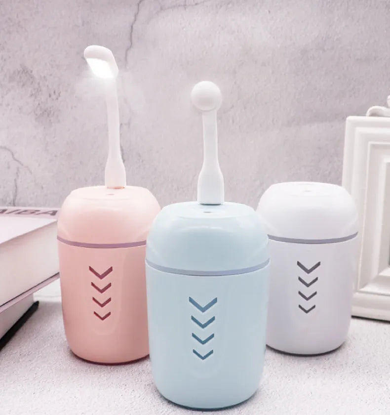 X3 model portable columnar car humidifier in blue, white, or pink with 200ml tank.